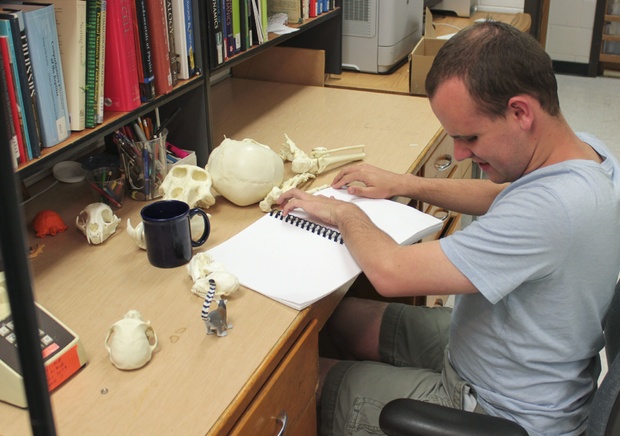 An undergraduate student tests an early version of the kit to provide feedback. (Bob Cieri).