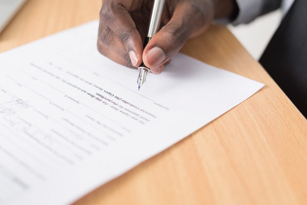 signature-document-cytonn-photography-GJao3ZTX9gU-unsplash