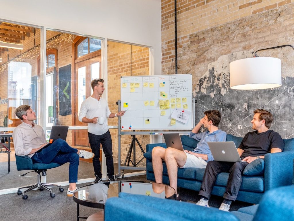 team-meeting-austin-distel-wD1LRb9OeEo-unsplash