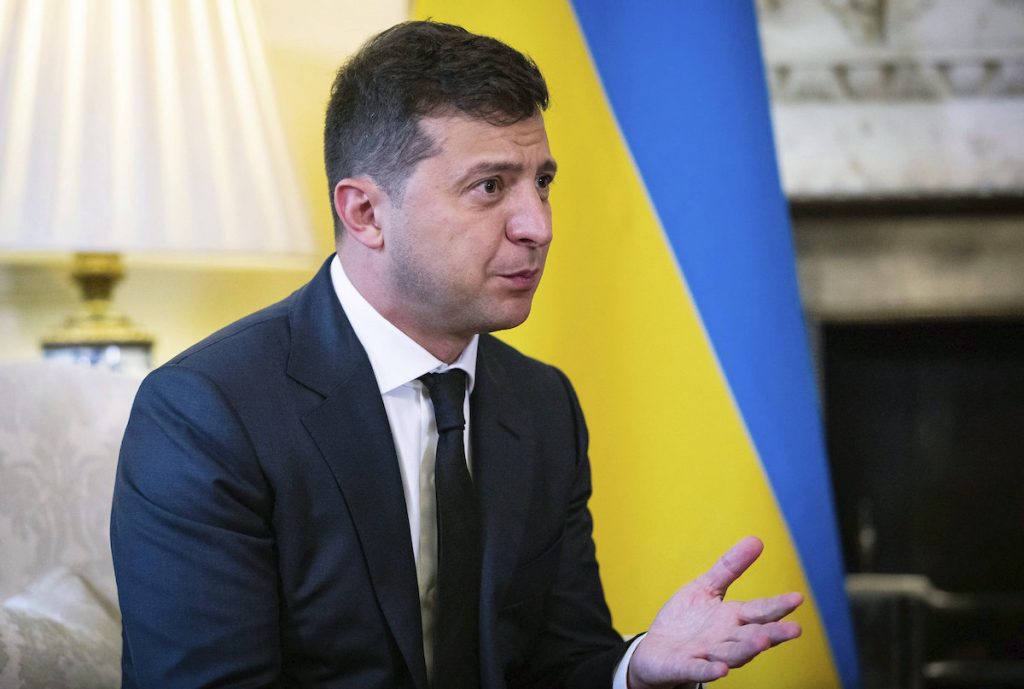 Ukraine President Volodymyr Zelensky, gestures as he talks to Britian's Prime Minister Boris Johnson, during a meeting, in Downing Street, London, Thursday, Oct. 8, 2020. The President is on a two day official visit to Britain. (Aaron Chown/Pool Photo via AP)